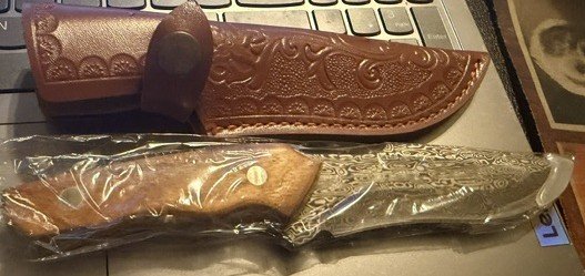Damascus-Pattern Fixed Blade Knife With Tooled Leather Sheath